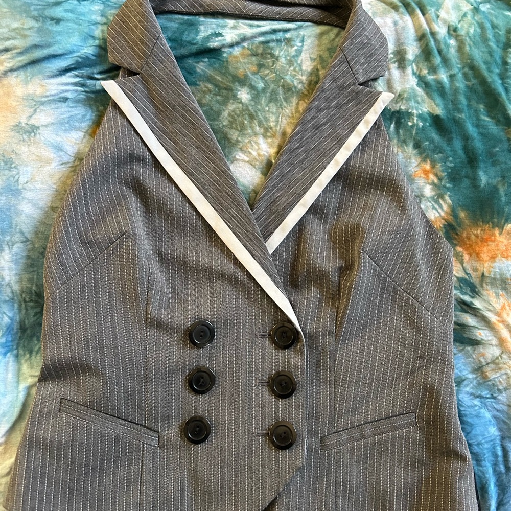 New without tags VERY SEXY Mixit Gray Striped Vest with open back.